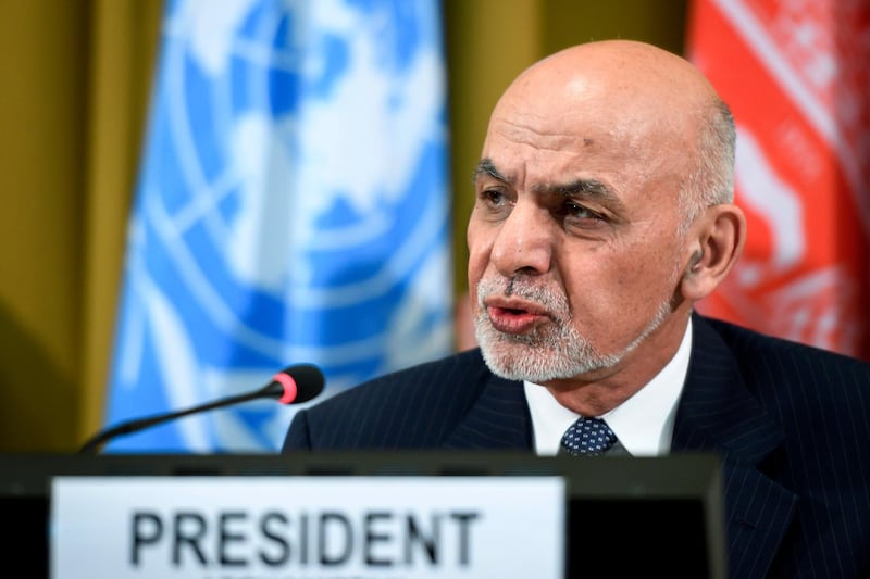 FILE - In this Nov. 28, 2018, file photo, Afghan president Ashraf Ghani talks during the United Nations Conference on Afghanistan at the UN Offices in Geneva, Switzerland. Ghani ordered Tuesday, Dec. 4, 2018, an investigation into allegations of sexual abuse of female athletes, saying that any kind of misconduct against athletes, male or female, was unacceptable. (Fabrice Coffrini/Pool Photo via AP, File)