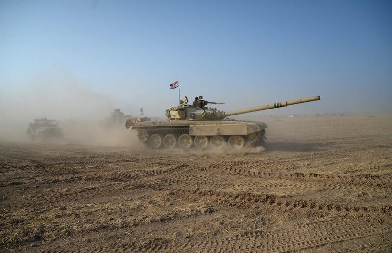 Iraqi security forces take part in an operation against ISIS in Al Shura, south of Mosul. Reuters