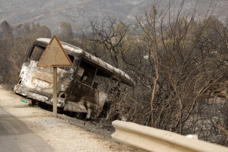 A burnt bus after wildfires El Tarf.  Getty Images