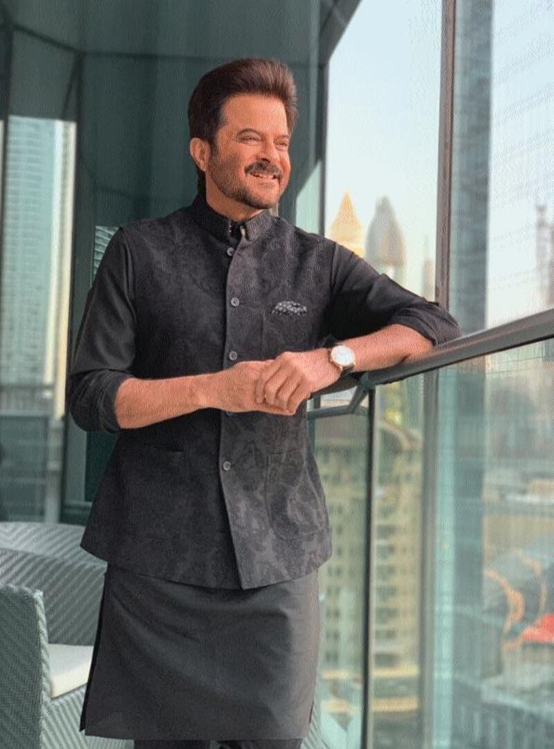 Bollywood hero Anil Kapoor looks out over Downtown Dubai on January 18. Kapoor was in town for the Malabar Gold and Diamonds party. Twitter / Anil Kapoor 