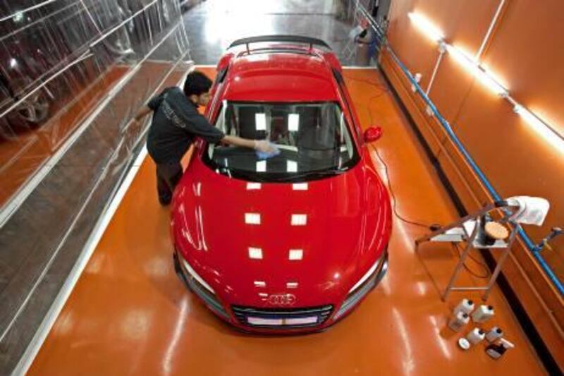 Dubai - September 28, 2011- Polishing Expert Mujeeb works on this Audi R8 GT at Select-Nano in Dubai, September 28, 2011. (Photo by Jeff Topping/The National) 

 