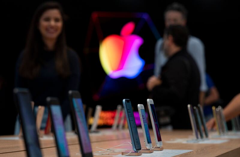 iPhones are displayed inside the renovated Apple Store at Fifth Avenue in New York City.  AFP