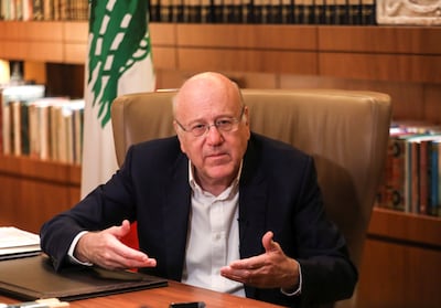 Lebanese Prime Minister Najib Mikati speaks during an interview with Reuters at the government palace in Beirut, Lebanon October 14, 2021.  REUTERS 