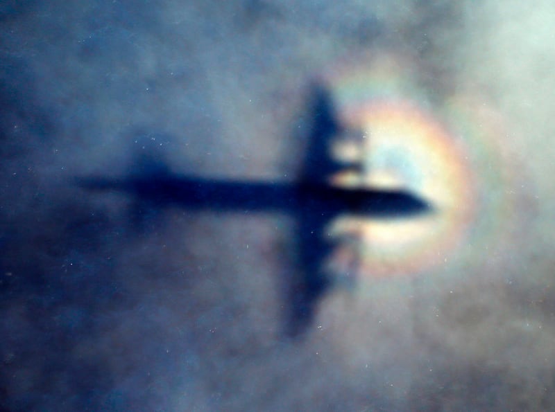 The shadow of a Royal New Zealand Air Force P3 Orion on low level cloud during the search, on March 31, 2014. AP