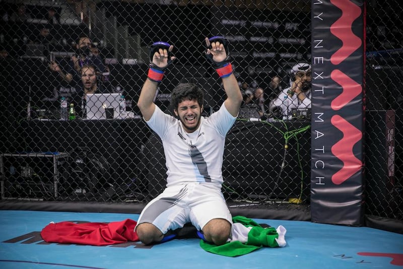 Jasem Al Hosani celebrates after winning gold at the IMMAF World Youth Championships at the Jiu-Jitsu Arena in Abu Dhabi. Photo: IMMAF