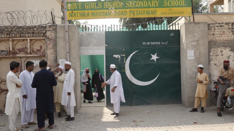 Pupils leaving Government Girls Higher Secondary School on Mathra Warsak Road, Peshawar