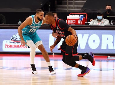 Jan 16, 2021; Tampa, Florida, USA; Toronto Raptors guard Norman Powell (24) drives to the basket against Charlotte Hornets forward Caleb Martin (10) during the first quarter at Amalie Arena. Mandatory Credit: Kim Klement-USA TODAY Sports