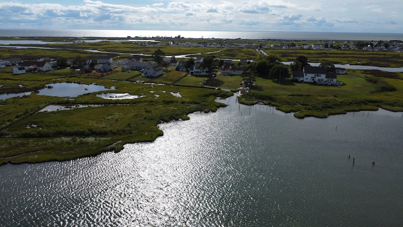 Rising sea levels coupled with erosion threaten to swallow parts of Tangier Island, including this group of houses on the eastern side. 