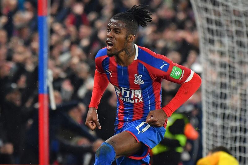 (FILES) In this file photo taken on December 16, 2019 Crystal Palace's Ivorian striker Wilfried Zaha celebrates after scoring their first goal during the English Premier League football match between Crystal Palace and Brighton and Hove Albion at Selhurst Park. Crystal Palace winger Wilfried Zaha has offered free accommodation to medical staff in his London properties as they treat patients with coronavirus. - RESTRICTED TO EDITORIAL USE. No use with unauthorized audio, video, data, fixture lists, club/league logos or 'live' services. Online in-match use limited to 120 images. An additional 40 images may be used in extra time. No video emulation. Social media in-match use limited to 120 images. An additional 40 images may be used in extra time. No use in betting publications, games or single club/league/player publications.
 / AFP / Ben STANSALL / RESTRICTED TO EDITORIAL USE. No use with unauthorized audio, video, data, fixture lists, club/league logos or 'live' services. Online in-match use limited to 120 images. An additional 40 images may be used in extra time. No video emulation. Social media in-match use limited to 120 images. An additional 40 images may be used in extra time. No use in betting publications, games or single club/league/player publications.
