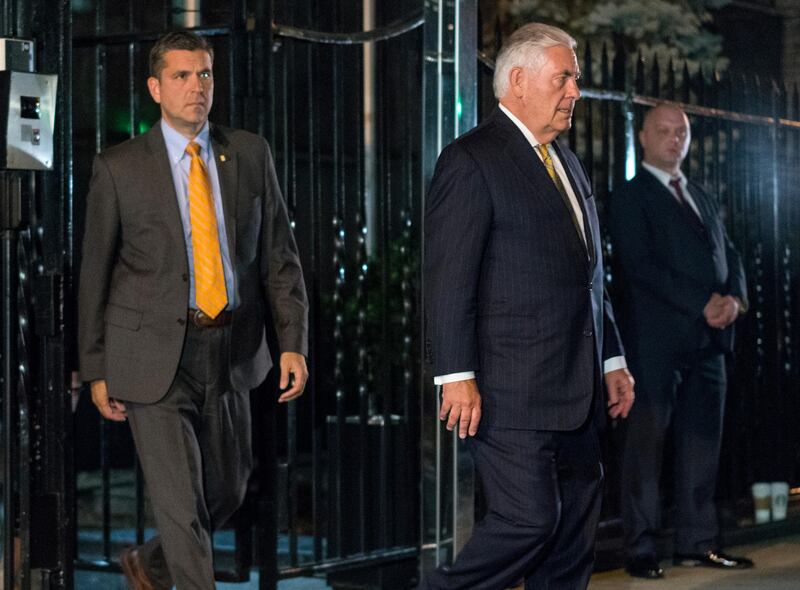 U.S. Secretary of State Rex Tillerson, right, leaves the Permanent Mission of the Russian Federation in New York, Sunday, Sept. 17, 2017, after a planned meeting with Russian Foreign Minister Sergey Lavrov. (AP Photo/Craig Ruttle)