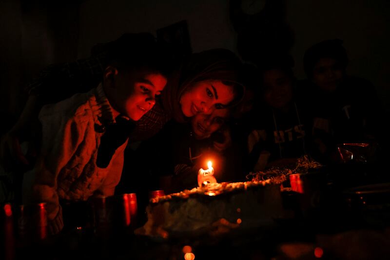 Noor Al Janabi celebrates her son's birthday at home in Baghdad.