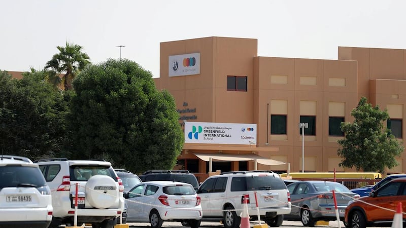 A woman has been arrested in connection with the death of a child struck by a car outside Greenfield International School in Dubai. Chris Whiteoak / The National