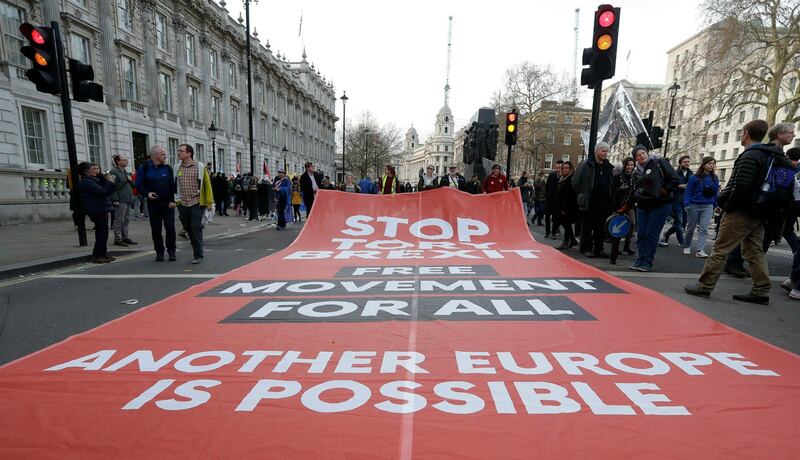 A large banner is unfurled along Whitehall. AP Photo/Kirsty Wigglesworth