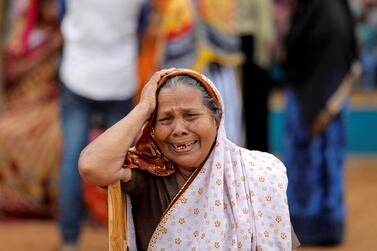 One of the residents moved from the site of a gun battle between troops and militants in Kalmunai on Sri Lanka's east coast, on April 27, 2019. Reuters