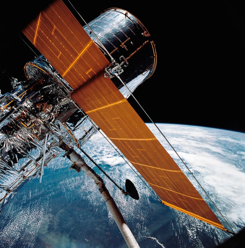 Mandatory Credit: Photo by Uncredited/AP/Shutterstock (10052642a)
In this April 25, 1990 photograph provided by NASA, most of the giant Hubble Space Telescope can be seen as it is suspended in space by Discovery's Remote Manipulator System (RMS) following the deployment of part of its solar panels and antennae. The Hubble Space Telescope's premier camera has shut down. NASA says the camera suspended operations, because of a hardware problem. Hubble's three other science instruments are still working fine, with celestial observations continuing
Hubble Trouble - 21 Apr 2015