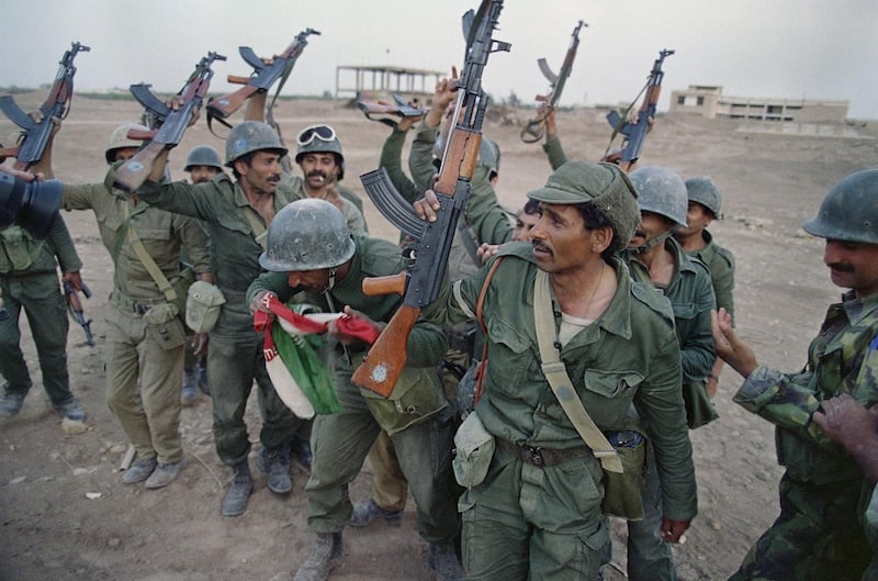 Iraqi soldiers celebrate their victory over Iran in the strategic Al Faw peninsula of south Iraq on April 20, 1988.  AFP