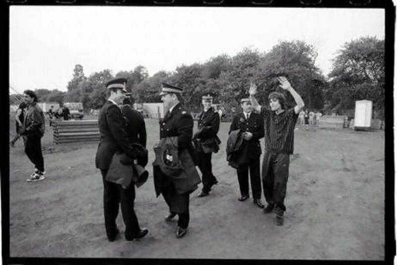 The Stone Roses frontman Ian Brown with the police on Glasgow Green in 1990. Paul Slattery