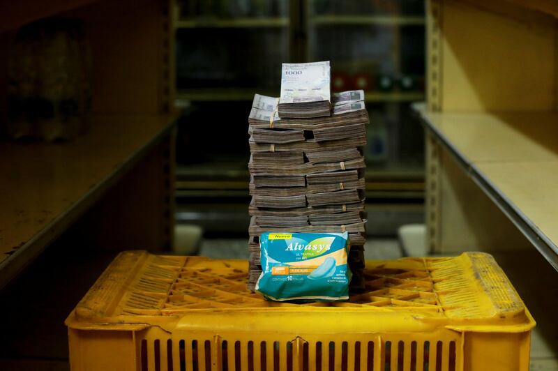 A package of pads is pictured next to 3,500,000 bolivars