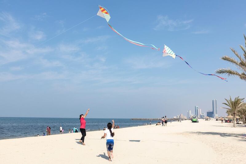 SHARJAH, UNITED ARAB EMIRATES, 3 DEC 2015. Families spend the day on the beach on the UAE's 44th National Day holiday. Photo: Reem Mohammed/ The National (Section: NA National Day) ID: 79339 *** Local Caption ***  RM_20151203_SHJ_04.JPG