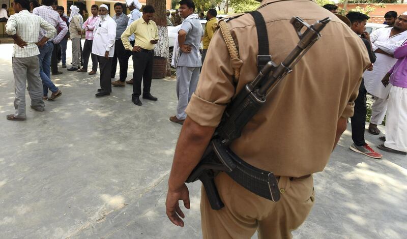 GREATER NOIDA, INDIA - MAY 25: Police personnel and villagers at Kotwali Jewar, on May 25, 2017 in Greater Noida, India. A gang of highway robbers allegedly dragged and raped four women in a field for hours and shot dead a male relative trying to save them off the Yamuna Expressway in Uttar Pradesh’s Gautam Budh Nagar. Eight members of a family were travelling to Bulandshahr from Greater Noida’s Jewar when they were waylaid by the gang at about 1.30 am. (Photo by Virendra Singh Gosain/Hindustan Times via Getty Images)