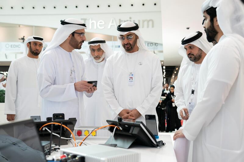 ABU DHABI, UNITED ARAB EMIRATES - February 20, 2019: HH Sheikh Mohamed bin Zayed Al Nahyan, Crown Prince of Abu Dhabi and Deputy Supreme Commander of the UAE Armed Forces (3rd R) visits Etimad Holding stand, during the 2019 International Defence Exhibition and Conference (IDEX), at Abu Dhabi National Exhibition Centre (ADNEC). Seen with HE Major General (Ret) Khaled Abdullah Al Bu Ainain, President of the Institute for Near East and Gulf Military Analysis (INEGMA) (3rd L).
( Ryan Carter for the Ministry of Presidential Affairs )
---