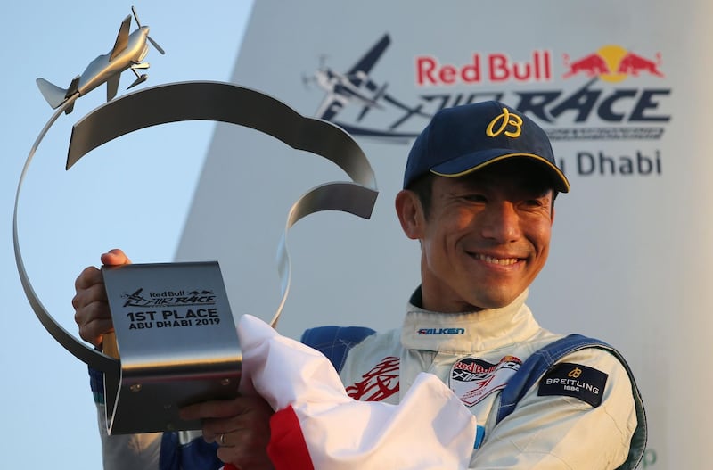 Yoshihide Muroya of Japan poses with his trophy. AFP