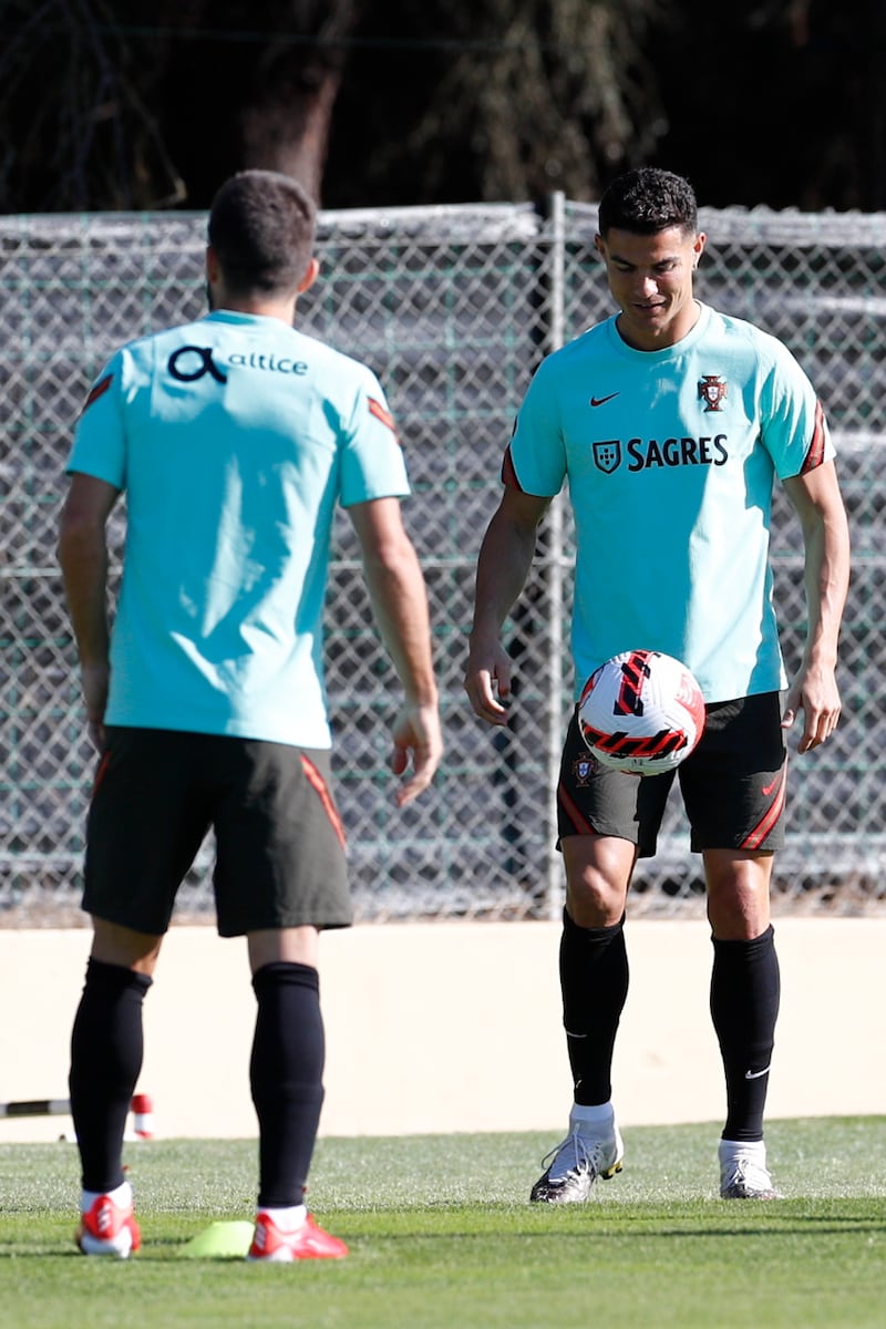 Joao Moutinho and Cristiano Ronaldo train in Almancil, Faro. EPA