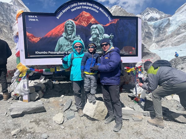 Alla, Ivan and Dmitrii Krasiukov at Mount Everest base camp.