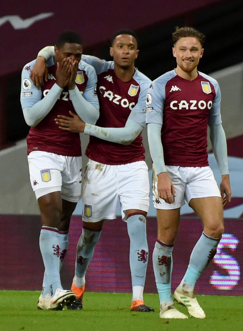 epa08904864 Kortney Hause (L) of Aston Villa celebrates with teammates after scoring the 2-0 lead during the English Premier League soccer match between Aston Villa and Crystal Palace in Birmingham, Britain, 26 December 2020.  EPA/Rui Vieira / POOL EDITORIAL USE ONLY. No use with unauthorized audio, video, data, fixture lists, club/league logos or 'live' services. Online in-match use limited to 120 images, no video emulation. No use in betting, games or single club/league/player publications.