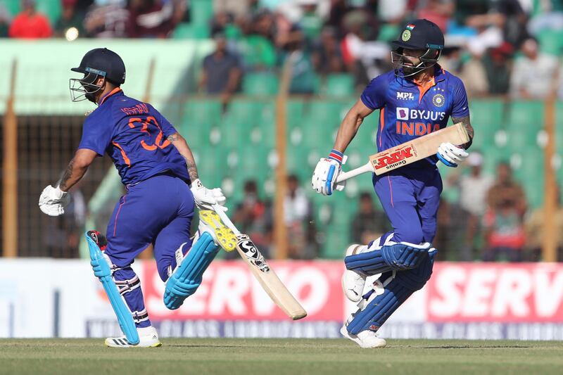 India's Virat Kohli, right, also scored a century on Saturday. AP