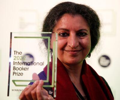 Geetanjali Shree with the 2022 International Booker Prize award for her novel 'Tomb of Sand' in London, on May 26, 2022. AP