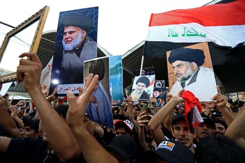 Supporters of Iraqi cleric Moqtada Al Sadr take to the streets of Nasiriyah against a rival bloc's nomination for prime minister this summer. AFP