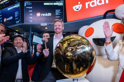 Reddit chief executive Steve Huffman stands on the floor of the New York Stock Exchange. Getty Images / AFP
