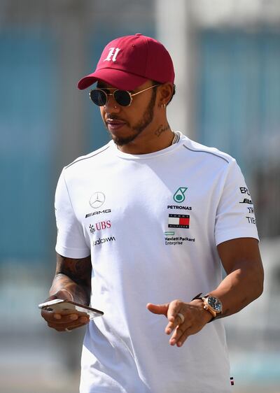 ABU DHABI, UNITED ARAB EMIRATES - NOVEMBER 22:  Lewis Hamilton of Great Britain and Mercedes GP walks in the Paddock during previews ahead of the Abu Dhabi Formula One Grand Prix at Yas Marina Circuit on November 22, 2018 in Abu Dhabi, United Arab Emirates.  (Photo by Clive Mason/Getty Images)