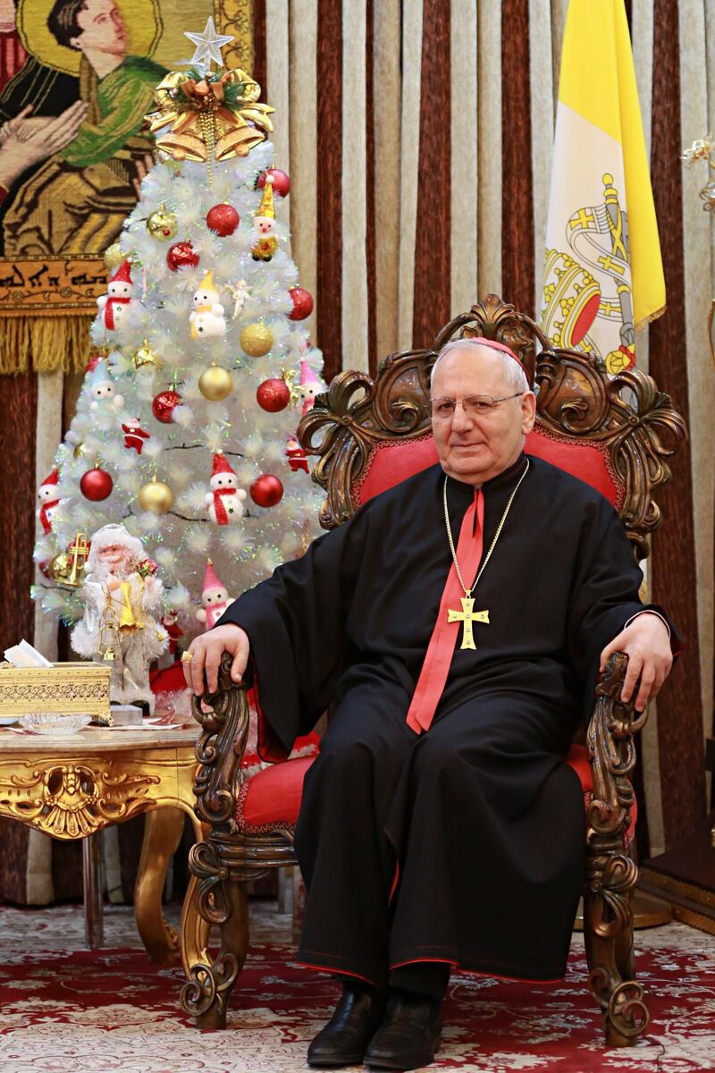 FILE -- In this Monday, Dec. 18, 2017 photo, Louis Raphael Sako, Chaldean Patriarch speaks during an interview with The Associated Press in Baghdad, Iraq. In a surprise announcement to pilgrims and tourists, Pope Francis has announced that he will make 14 new cardinals next June 29, among which is Chaldean Pathriach Sako. (AP Photo/Khalid Mohammed)