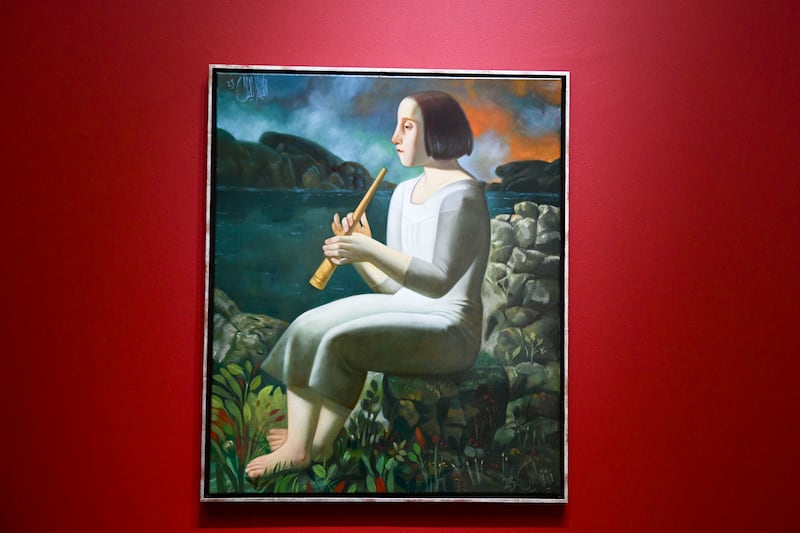 Aleiby’s figures are characters in a larger story, such as this one where a woman plays a flute on a cliffside