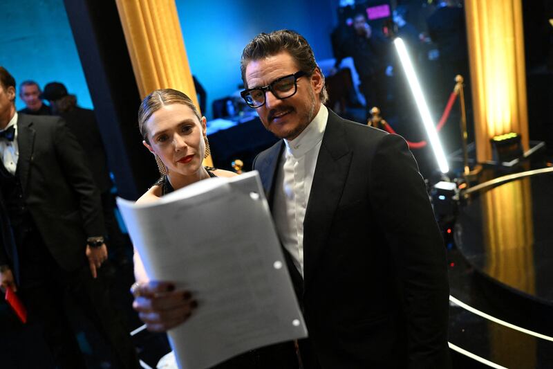 The actor and Elizabeth Olsen at the 95th Academy Awards on March 12,2023. Reuters