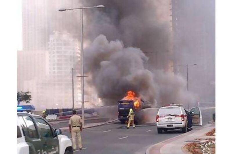 A reader expresses concern for the passengers of a shuttle bus that caught fire in Dubai. Witnesses said nobody was hurt in the fire, which was extinguished by emergency services personnel. The National / courtesy Bryanne Tait