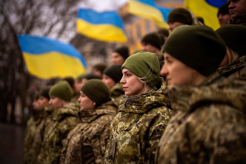 Ukrainian Army soldiers pose for a photo as they gather to celebrate a Day of Unity in Odessa, Ukraine. AP Photo