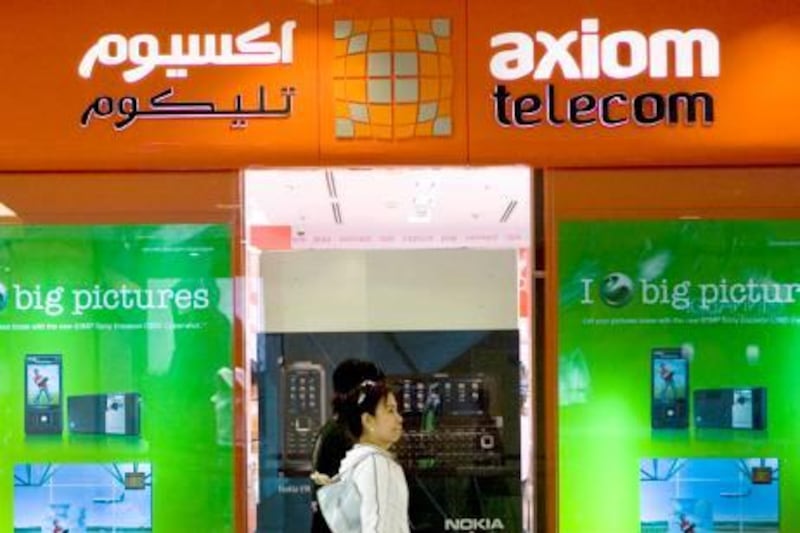 Abu Dhabi - December 9, 2008: The exterior of an Axiom Telecom store at Abu Dhabi Mall. ( Philip Cheung / The National ) *** Local Caption *** PC0006-AxiomStock.JPG