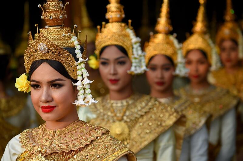 Dancers line up to perform during the Cambodian People's Party ceremony to mark the 40th anniversary of the fall of the Khmer Rouge regime at the National Olympic Stadium in Phnom Penh. AFP