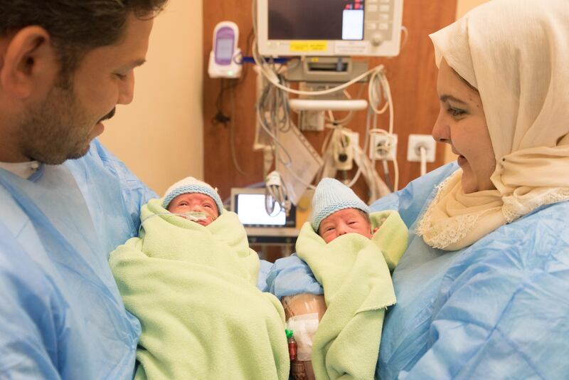 Twins Mahmoud and Ahmed Abdel Qader Darwish with their parents. Photos by Danat Al Emarat Hospital.