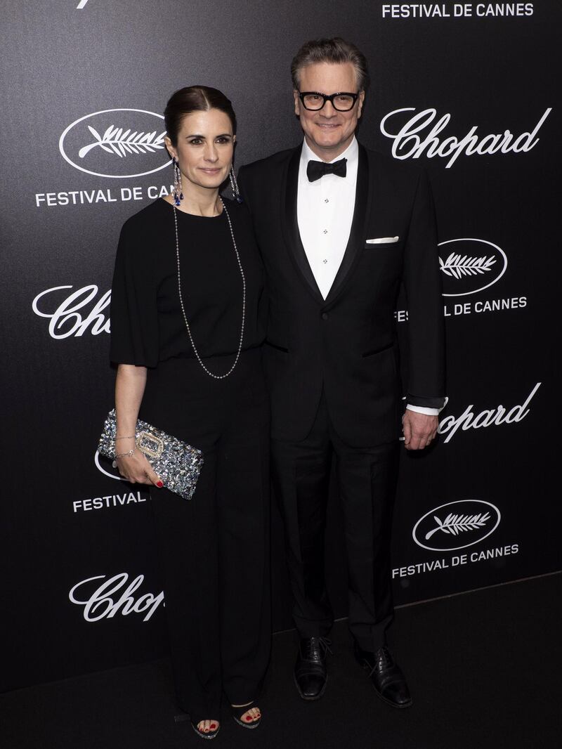 epa07587988 Colin Firth (R) and wife Livia Firth (L) attend the Trophee Chopard Dinner at the Agora during the 72nd annual Cannes Film Festival, in Cannes, France, 20 May 2019. The festival runs from 14 to 25 May.  EPA/JEROME ROUX