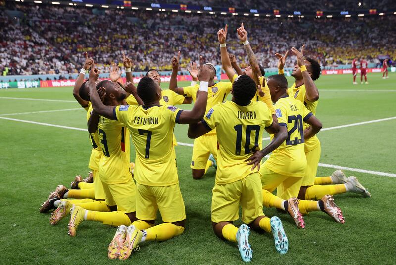 Ecuador's Enner Valencia celebrates with teammates after scoring the opening goal from the penalty spot in the 2-0 win against Qatar at Al Bayt Stadium on November 20, 2022. Getty