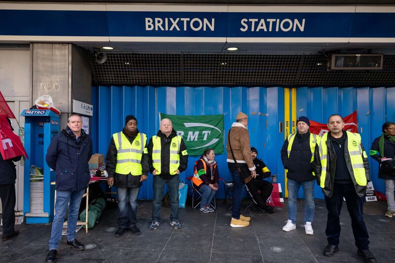 London Underground workers strike outside Brixton station in London. Bloomberg