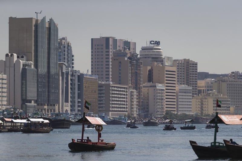 Major development now lines the Deira side of Dubai Creek with the distinctive circular top of Deira Tower visible at centre right.