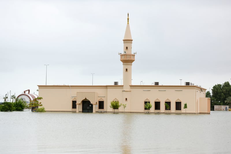 Jama Al Ghurfa Mosque on Fujairah's corniche surrounded by floodwaters. Khushnum Bhandari / The National