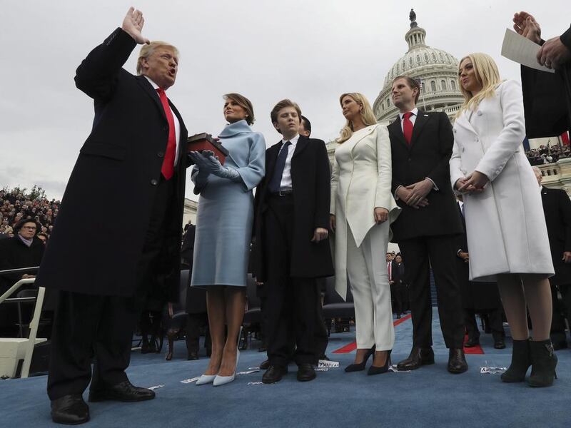 President Donald Trump takes the oath of office. Jim Bourg / EPA