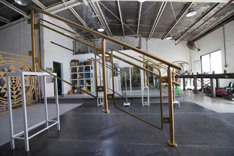 Interior designs and products, such as this handrail, are being prepared at DRA Product Designs Industry in Al Quoz.