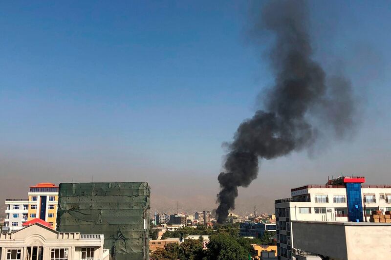 A plume of smoke rises following an explosion targeting the convoy of Afghanistan's First Vice President Amrullah Saleh in Kabul. AFP